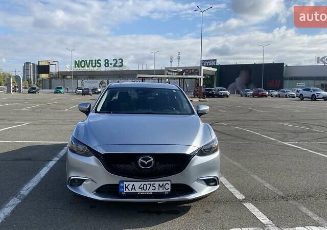 Серый Мазда 6, объемом двигателя 2.49 л и пробегом 140 тыс. км за 16000 $, фото 1 на Automoto.ua