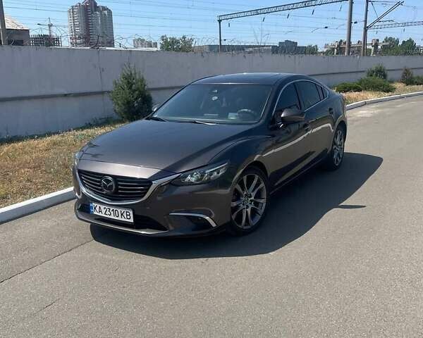 Сірий Мазда 6, об'ємом двигуна 2.5 л та пробігом 124 тис. км за 14900 $, фото 1 на Automoto.ua