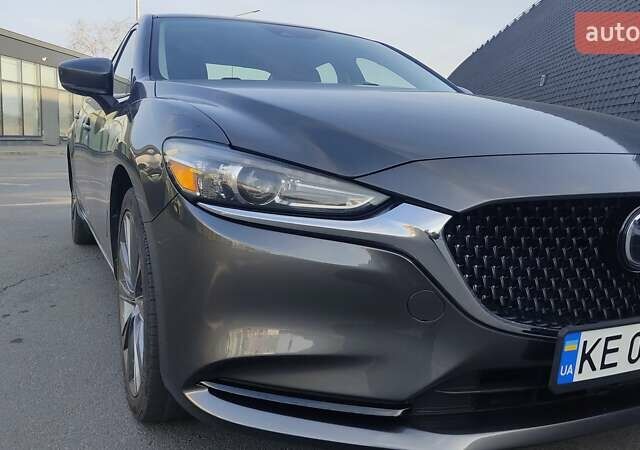 Серый Мазда 6, объемом двигателя 2.49 л и пробегом 100 тыс. км за 17500 $, фото 1 на Automoto.ua