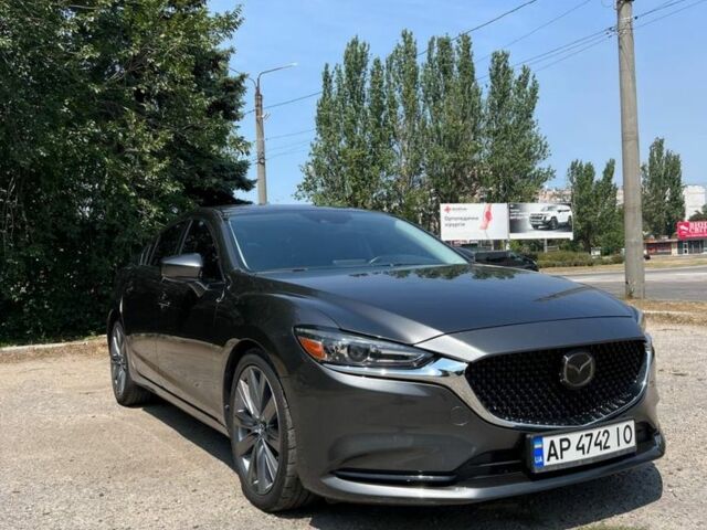 Серый Мазда 6, объемом двигателя 2.5 л и пробегом 80 тыс. км за 17700 $, фото 1 на Automoto.ua