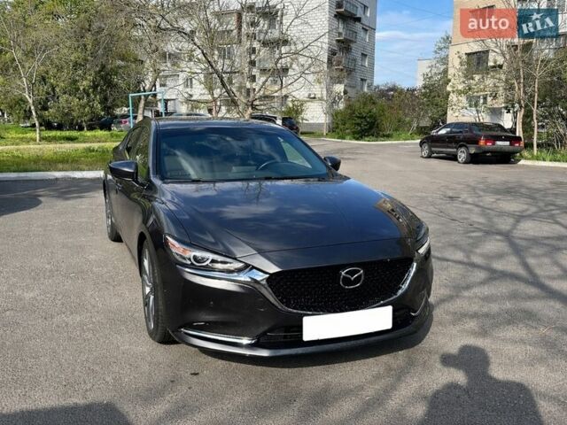 Серый Мазда 6, объемом двигателя 2.49 л и пробегом 56 тыс. км за 20500 $, фото 1 на Automoto.ua