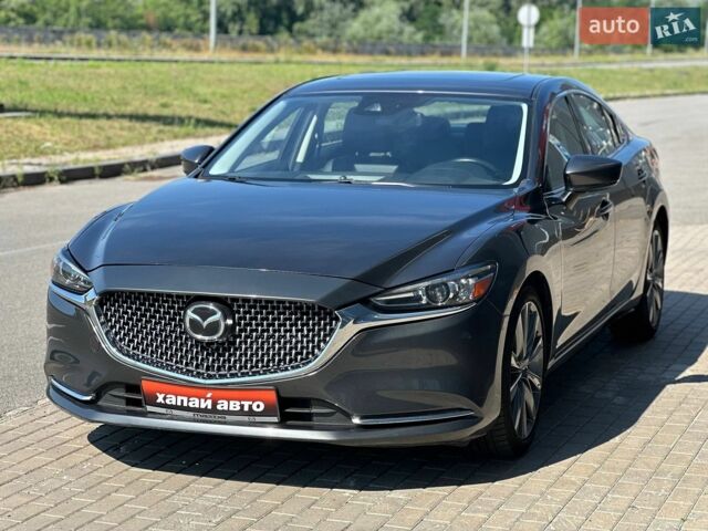 Серый Мазда 6, объемом двигателя 2.49 л и пробегом 78 тыс. км за 16700 $, фото 1 на Automoto.ua