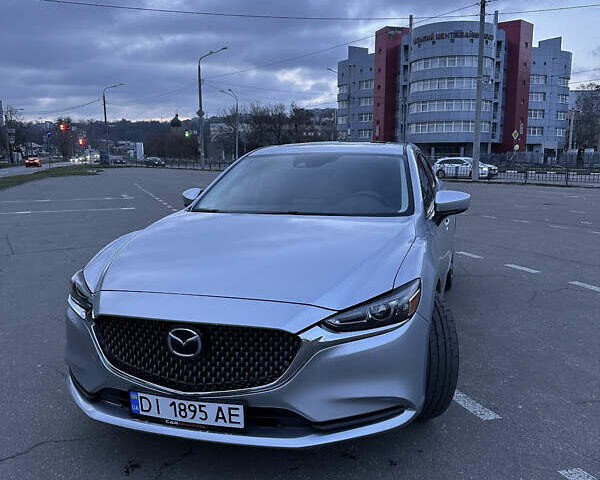 Серый Мазда 6, объемом двигателя 2.49 л и пробегом 122 тыс. км за 18000 $, фото 1 на Automoto.ua