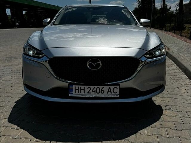 Серый Мазда 6, объемом двигателя 2 л и пробегом 82 тыс. км за 16900 $, фото 1 на Automoto.ua
