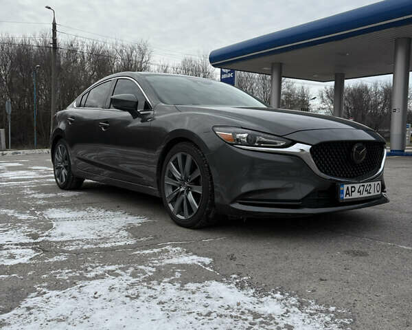 Серый Мазда 6, объемом двигателя 2.49 л и пробегом 80 тыс. км за 17400 $, фото 1 на Automoto.ua