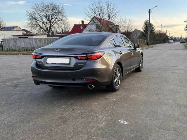 Серый Мазда 6, объемом двигателя 2 л и пробегом 68 тыс. км за 10100 $, фото 1 на Automoto.ua