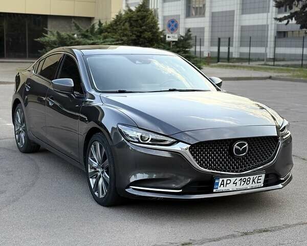 Серый Мазда 6, объемом двигателя 2.49 л и пробегом 117 тыс. км за 15999 $, фото 1 на Automoto.ua