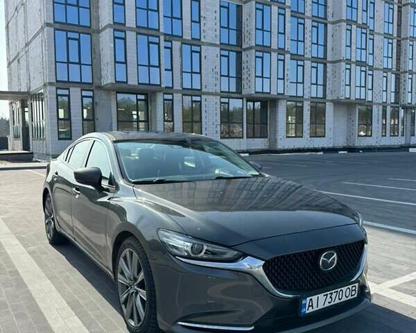 Серый Мазда 6, объемом двигателя 2.49 л и пробегом 84 тыс. км за 16750 $, фото 1 на Automoto.ua