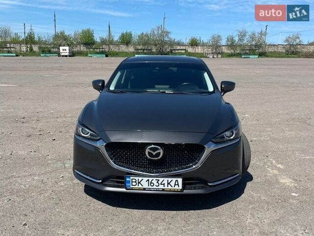 Серый Мазда 6, объемом двигателя 2.49 л и пробегом 128 тыс. км за 19699 $, фото 1 на Automoto.ua