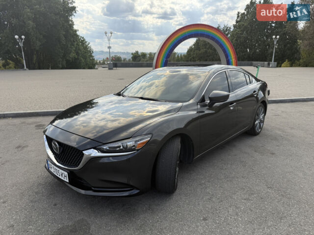 Серый Мазда 6, объемом двигателя 2.49 л и пробегом 91 тыс. км за 21000 $, фото 1 на Automoto.ua
