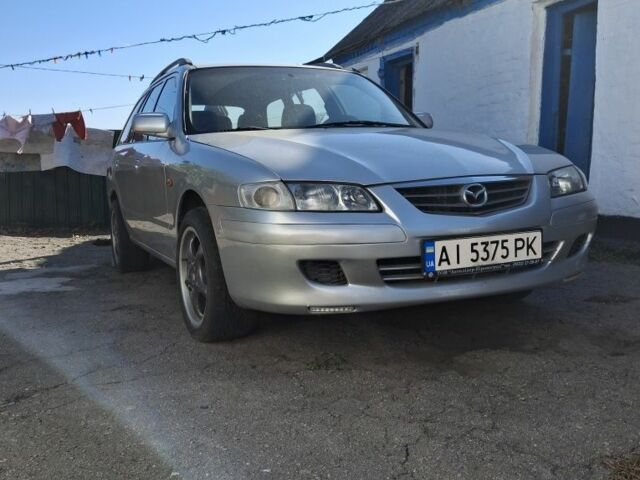 Серый Мазда 6, объемом двигателя 2 л и пробегом 260 тыс. км за 3000 $, фото 1 на Automoto.ua