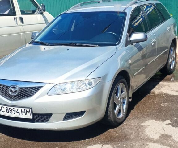 Серый Мазда 6, объемом двигателя 2 л и пробегом 246 тыс. км за 4000 $, фото 1 на Automoto.ua