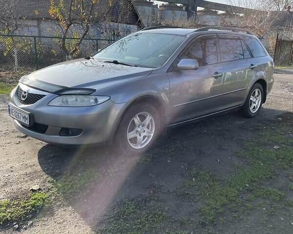 Серый Мазда 6, объемом двигателя 2 л и пробегом 218 тыс. км за 3550 $, фото 1 на Automoto.ua