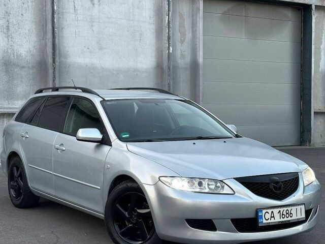 Серый Мазда 6, объемом двигателя 2 л и пробегом 328 тыс. км за 3350 $, фото 1 на Automoto.ua