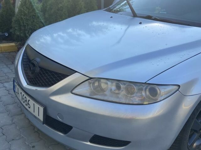 Сірий Мазда 6, об'ємом двигуна 2 л та пробігом 328 тис. км за 3261 $, фото 1 на Automoto.ua