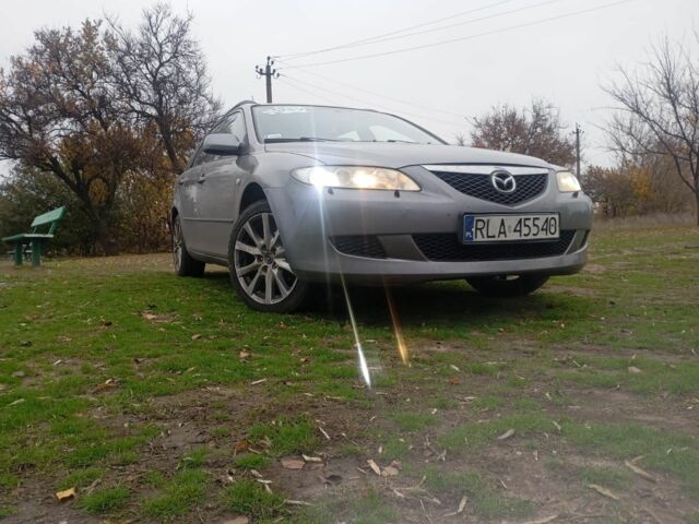 Серый Мазда 6, объемом двигателя 2 л и пробегом 296 тыс. км за 3300 $, фото 1 на Automoto.ua