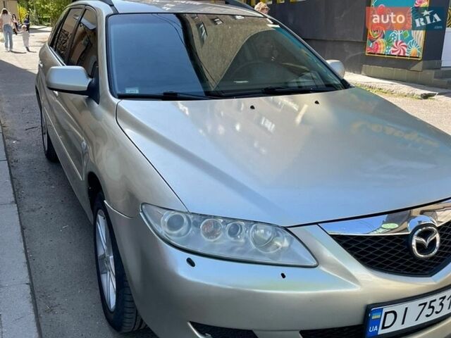 Серый Мазда 6, объемом двигателя 2 л и пробегом 341 тыс. км за 2900 $, фото 1 на Automoto.ua