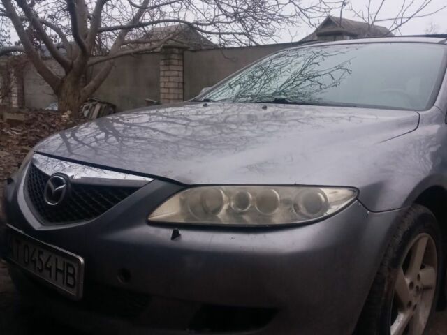 Серый Мазда 6, объемом двигателя 2 л и пробегом 300 тыс. км за 3000 $, фото 1 на Automoto.ua