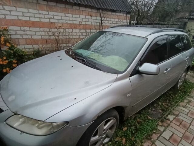 Серый Мазда 6, объемом двигателя 2 л и пробегом 320 тыс. км за 1691 $, фото 1 на Automoto.ua