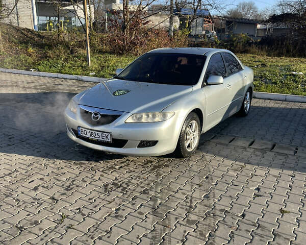 Серый Мазда 6, объемом двигателя 1.8 л и пробегом 300 тыс. км за 3100 $, фото 1 на Automoto.ua