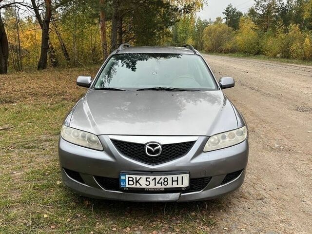 Серый Мазда 6, объемом двигателя 2 л и пробегом 350 тыс. км за 3003 $, фото 1 на Automoto.ua