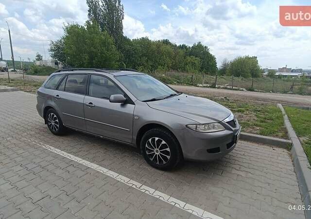 Серый Мазда 6, объемом двигателя 1.8 л и пробегом 185 тыс. км за 3200 $, фото 1 на Automoto.ua