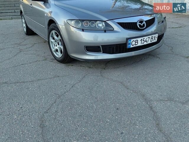 Серый Мазда 6, объемом двигателя 2 л и пробегом 256 тыс. км за 3600 $, фото 1 на Automoto.ua