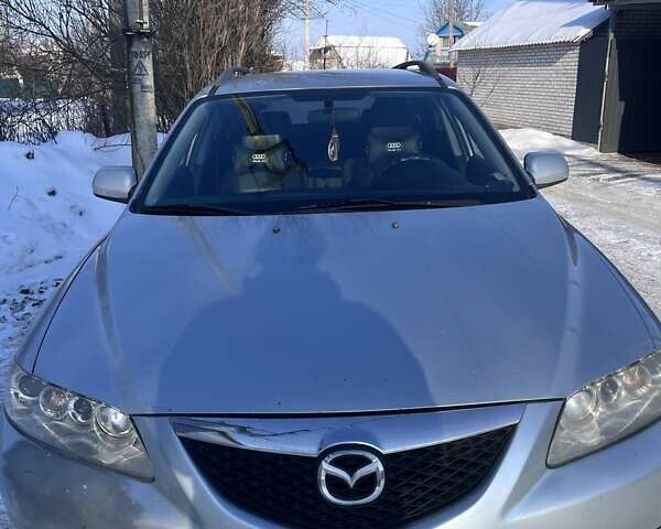 Серый Мазда 6, объемом двигателя 2 л и пробегом 350 тыс. км за 3700 $, фото 1 на Automoto.ua