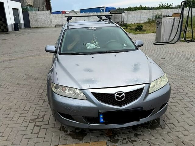 Серый Мазда 6, объемом двигателя 2 л и пробегом 300 тыс. км за 2500 $, фото 1 на Automoto.ua