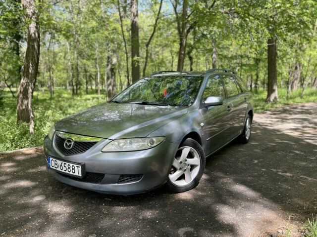 Серый Мазда 6, объемом двигателя 2 л и пробегом 350 тыс. км за 1550 $, фото 1 на Automoto.ua