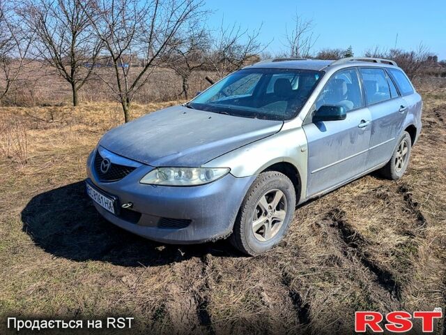 Серый Мазда 6, объемом двигателя 2 л и пробегом 111 тыс. км за 1500 $, фото 1 на Automoto.ua
