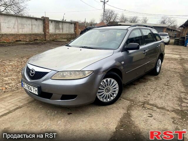 Серый Мазда 6, объемом двигателя 2 л и пробегом 270 тыс. км за 2400 $, фото 1 на Automoto.ua