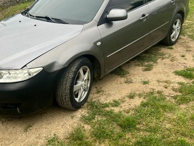 Серый Мазда 6, объемом двигателя 2 л и пробегом 39 тыс. км за 2400 $, фото 1 на Automoto.ua