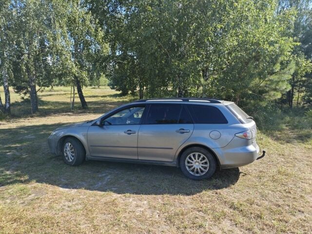 Серый Мазда 6, объемом двигателя 2 л и пробегом 365 тыс. км за 1900 $, фото 1 на Automoto.ua