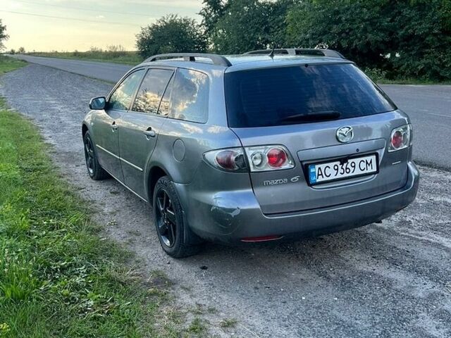 Сірий Мазда 6, об'ємом двигуна 2 л та пробігом 321 тис. км за 5000 $, фото 1 на Automoto.ua