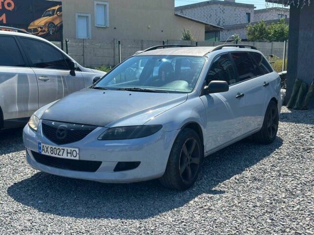 Серый Мазда 6, объемом двигателя 2 л и пробегом 300 тыс. км за 2491 $, фото 1 на Automoto.ua