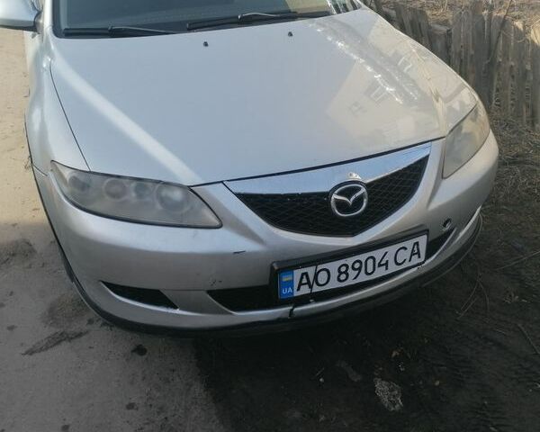 Серый Мазда 6, объемом двигателя 2 л и пробегом 340 тыс. км за 2100 $, фото 1 на Automoto.ua