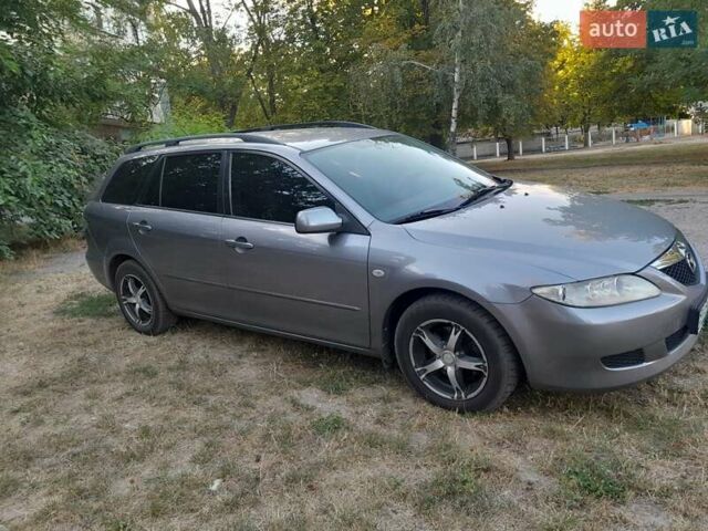 Серый Мазда 6, объемом двигателя 2 л и пробегом 336 тыс. км за 3900 $, фото 1 на Automoto.ua
