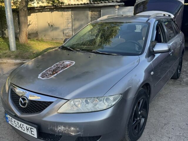 Серый Мазда 6, объемом двигателя 2 л и пробегом 389 тыс. км за 3310 $, фото 1 на Automoto.ua