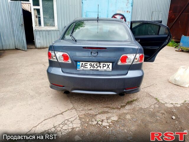 Серый Мазда 6, объемом двигателя 2.3 л и пробегом 311 тыс. км за 5800 $, фото 1 на Automoto.ua