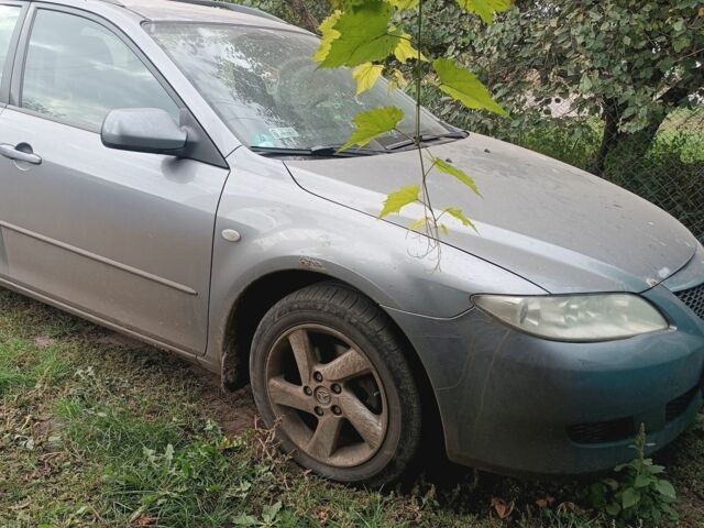 Серый Мазда 6, объемом двигателя 2 л и пробегом 350 тыс. км за 1566 $, фото 1 на Automoto.ua