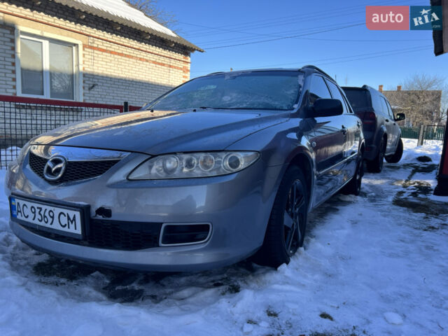 Серый Мазда 6, объемом двигателя 2 л и пробегом 319 тыс. км за 4200 $, фото 1 на Automoto.ua