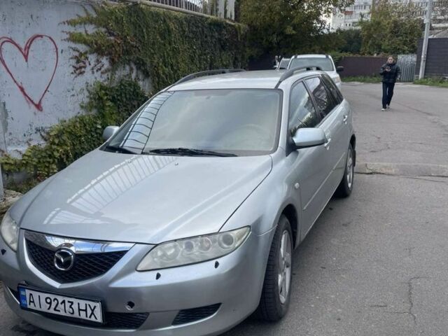 Серый Мазда 6, объемом двигателя 2 л и пробегом 284 тыс. км за 3000 $, фото 1 на Automoto.ua