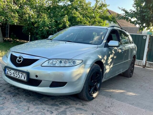 Серый Мазда 6, объемом двигателя 2 л и пробегом 300 тыс. км за 1850 $, фото 1 на Automoto.ua