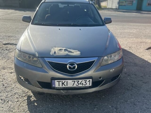 Серый Мазда 6, объемом двигателя 2 л и пробегом 280 тыс. км за 1600 $, фото 1 на Automoto.ua