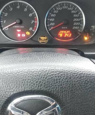 Серый Мазда 6, объемом двигателя 1.8 л и пробегом 297 тыс. км за 3999 $, фото 1 на Automoto.ua