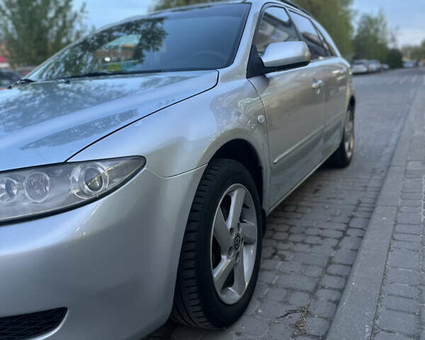 Серый Мазда 6, объемом двигателя 2 л и пробегом 257 тыс. км за 3690 $, фото 1 на Automoto.ua