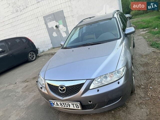 Серый Мазда 6, объемом двигателя 2 л и пробегом 248 тыс. км за 3200 $, фото 1 на Automoto.ua