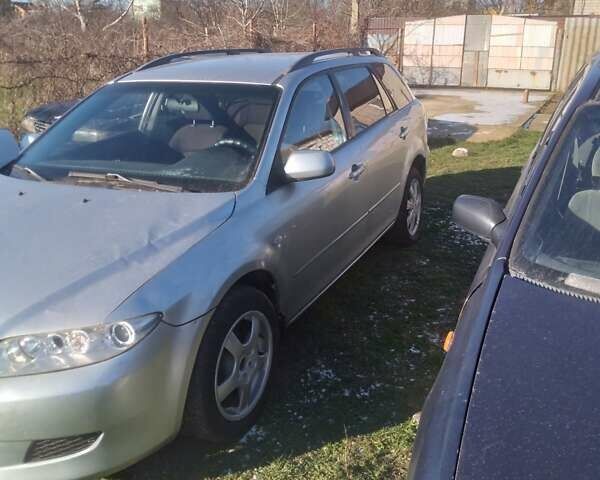 Серый Мазда 6, объемом двигателя 2 л и пробегом 300 тыс. км за 2700 $, фото 1 на Automoto.ua