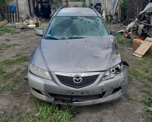 Серый Мазда 6, объемом двигателя 2 л и пробегом 250 тыс. км за 1700 $, фото 1 на Automoto.ua